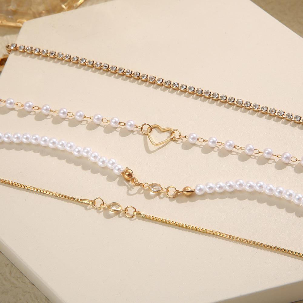 Damen Armband-Set mit eleganten Perlen- und Kristallakzenten Shop Nory