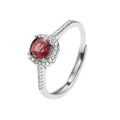 Damen Ring mit rot geschliffenem Edelstein und funkelnden Zirkoniasteinen Shop Nory