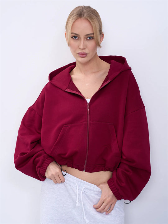 Damen legeres Cropped-Fleece-Hoodie mit Tunnelzugbund, Raglanärmeln und Reißverschluss Shop Nory