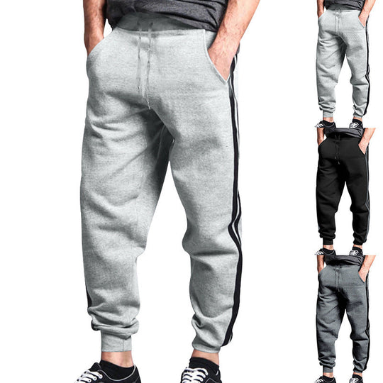 Herren sportliche Jogginghose mit seitlichen Kontraststreifen und elastischem Bund Shopnory
