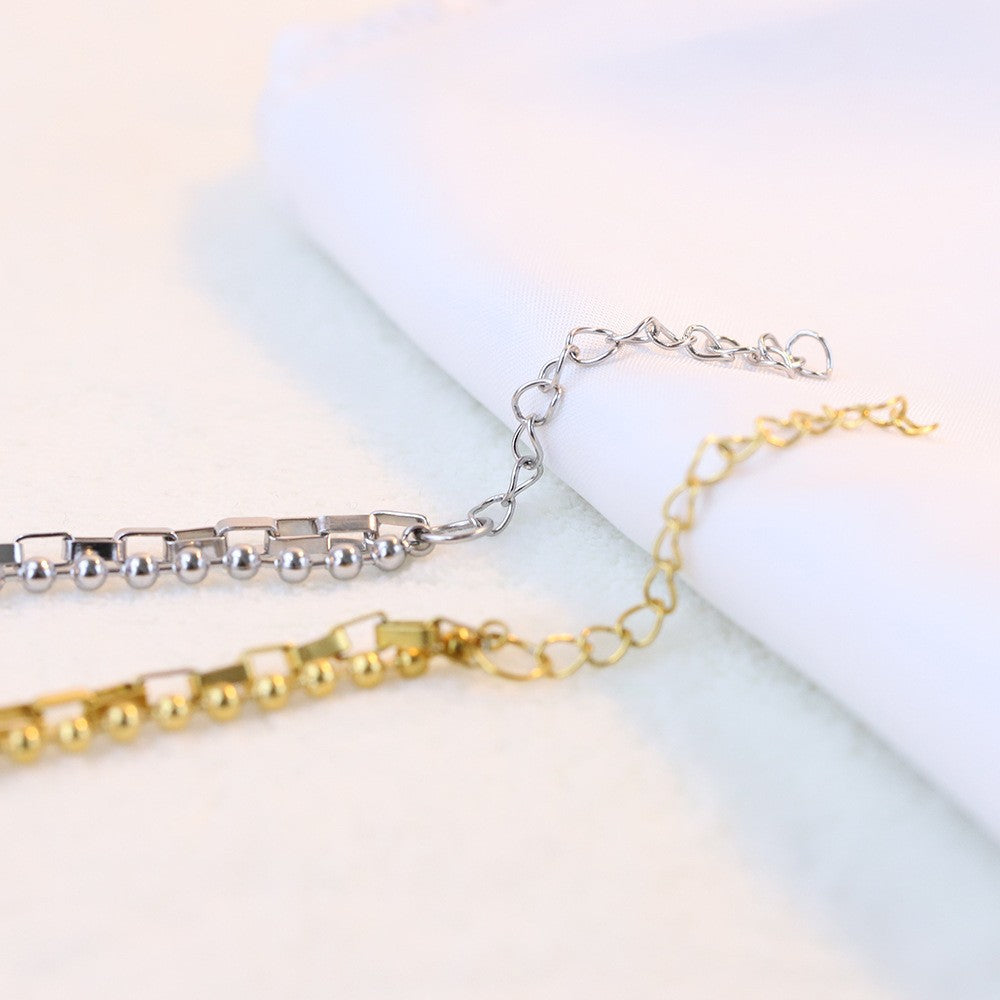 Damen Armband mit trendigem Doppel-Design und Anhängern Shop Nory