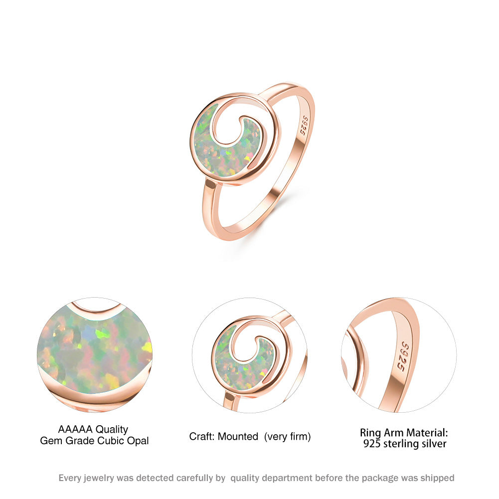 Damen Ring mit eleganter Spiralform und schimmerndem Opal Shop Nory