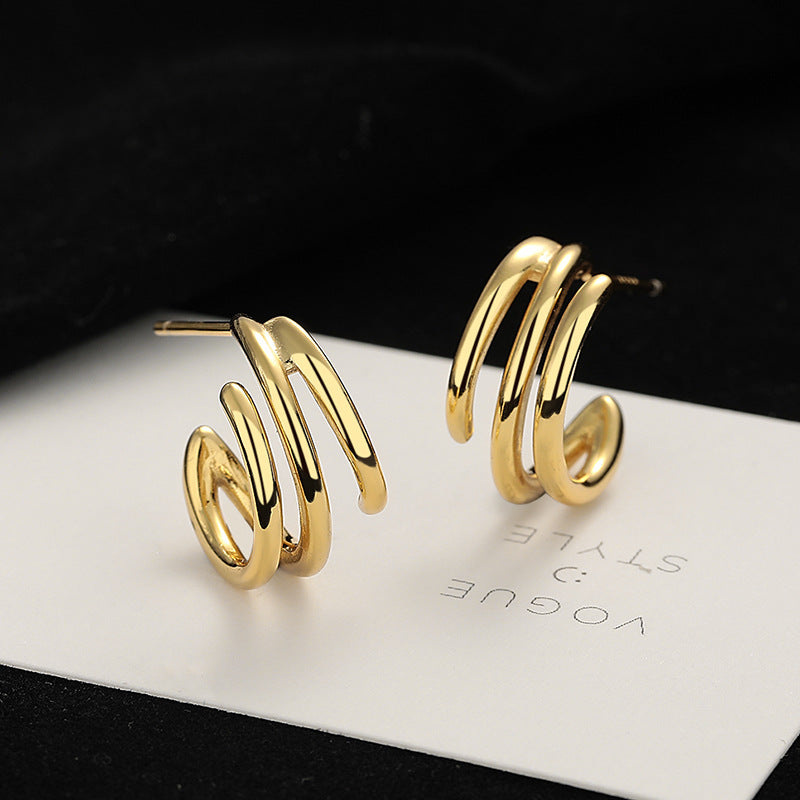 Damen Ohrstecker mit elegantem, geschwungenem Design Shop Nory