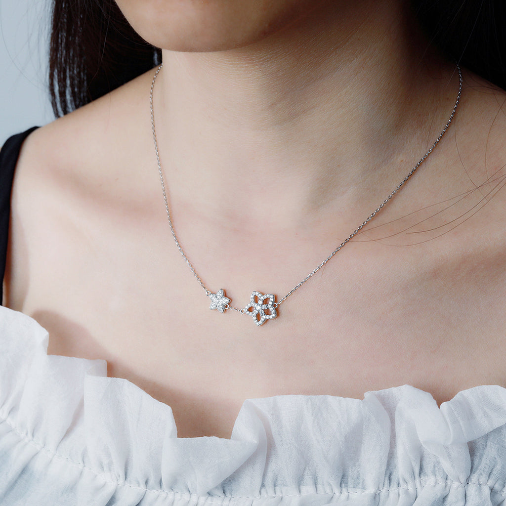 Damen Halskette mit floralen Anhängern und funkelnden Zirkonia Shop Nory