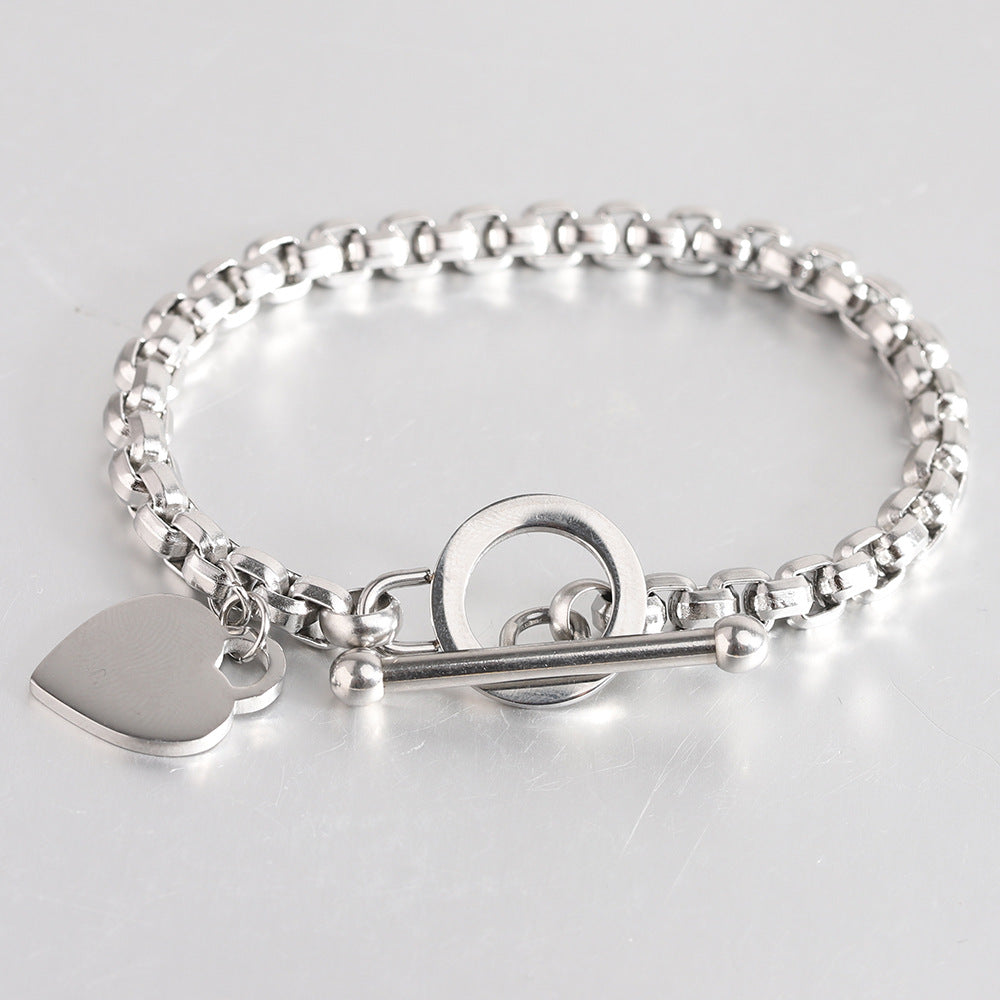 Damen Armband mit herzförmigem Anhänger und doppeltem Edelstahl-Design Shop Nory