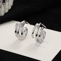 Damen Ohrstecker mit elegantem, geschwungenem Design Shop Nory