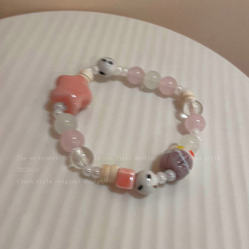 Damen Armband mit handgefertigten Natursteinperlen und Tieranhänger Shop Nory