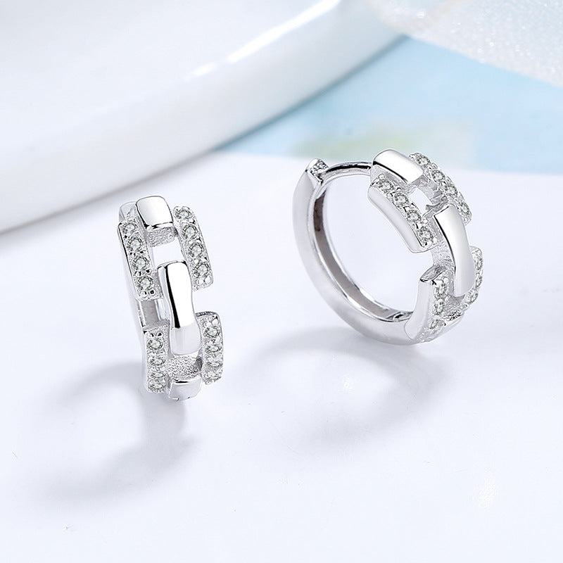 Damen Ohrringe mit modernem Kettendesign und glitzernden Details Shop Nory