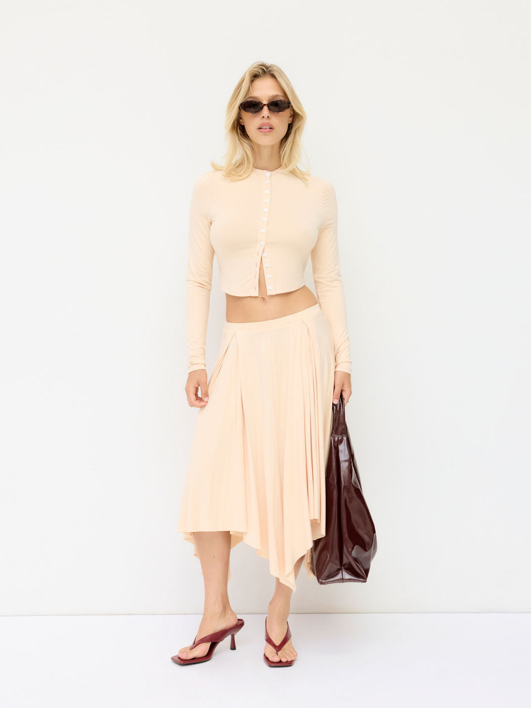 Damen Cropped-Cardigan mit Perlmuttknöpfen und asymmetrischem Zipfel-Midirock Shop Nory