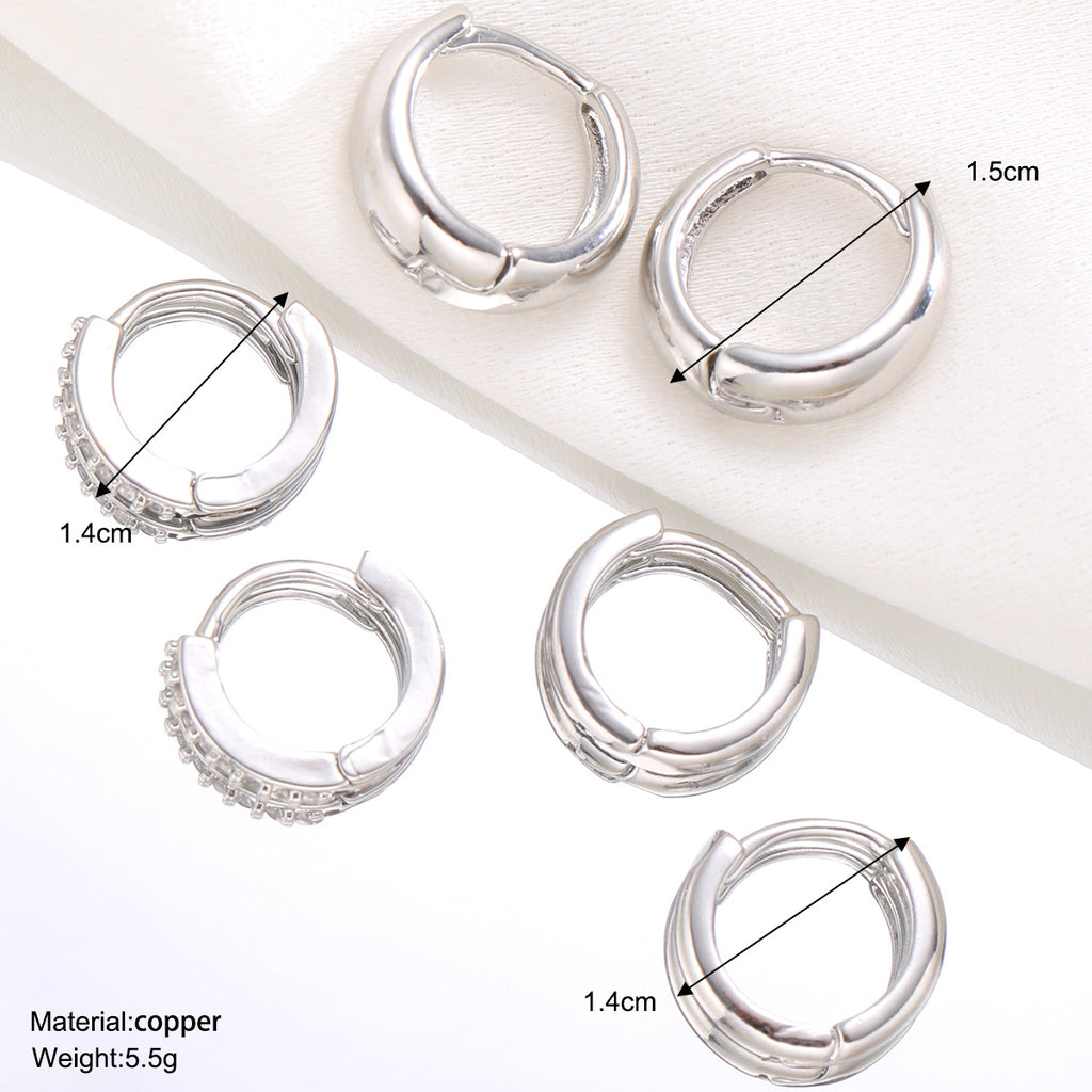 Damen Ohrringe mit funkelnden Zirkonia und geschwungenem Design Shop Nory