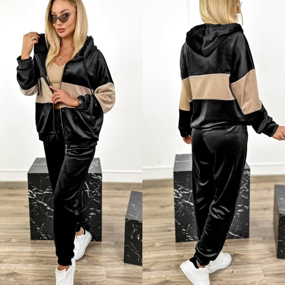 Damen kuscheliger Velours-Zweiteiler Trainingsanzug mit Reißverschluss-Kapuze und hochgeschnittener Jogger Shop Nory