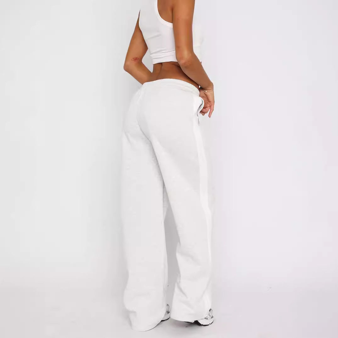 Damen weite High-Waist Jogginghose mit seitlichem Kontrast-Streifen und Taschen Shop Nory
