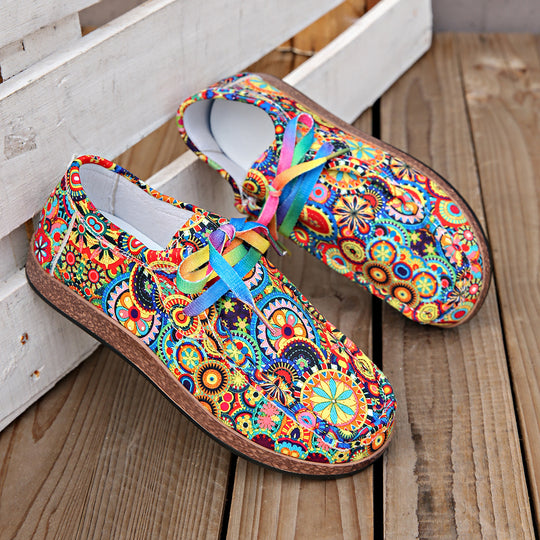 Damen Bequeme Plateau-Slipper im Ethno‑Print mit Korkoptik‑Sohle Shop Nory