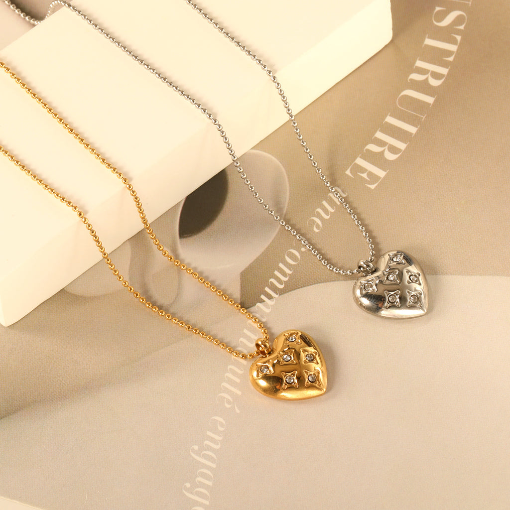 Damen Halskette mit herzförmigem Anhänger und funkelnden Zirkonia Steinen Shop Nory