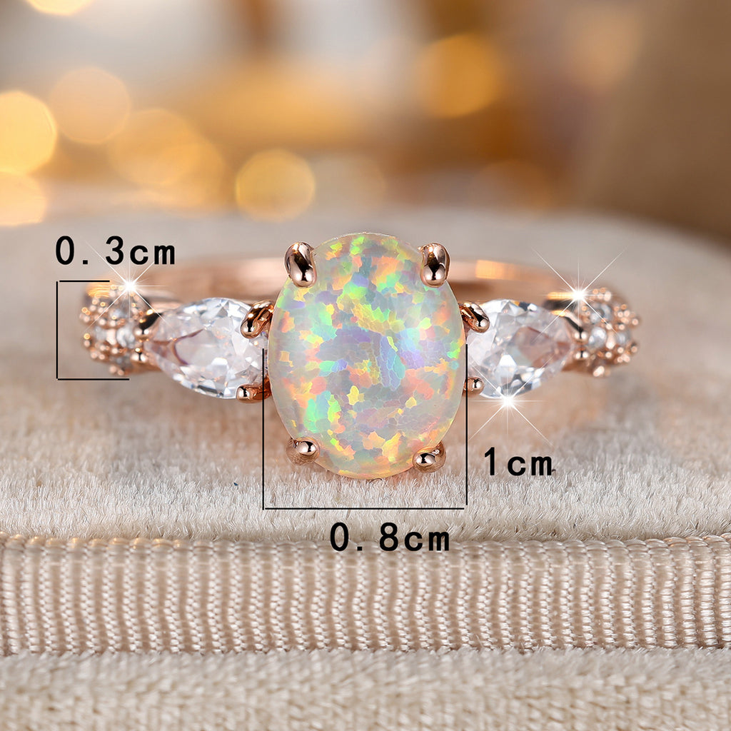 Damen Ring mit schimmerndem Opal und funkelnden Zirkonia-Elementen Shop Nory