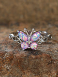 Damen Ring mit kunstvollem Schmetterlingsdesign und schimmernden Opal-Elementen Shop Nory