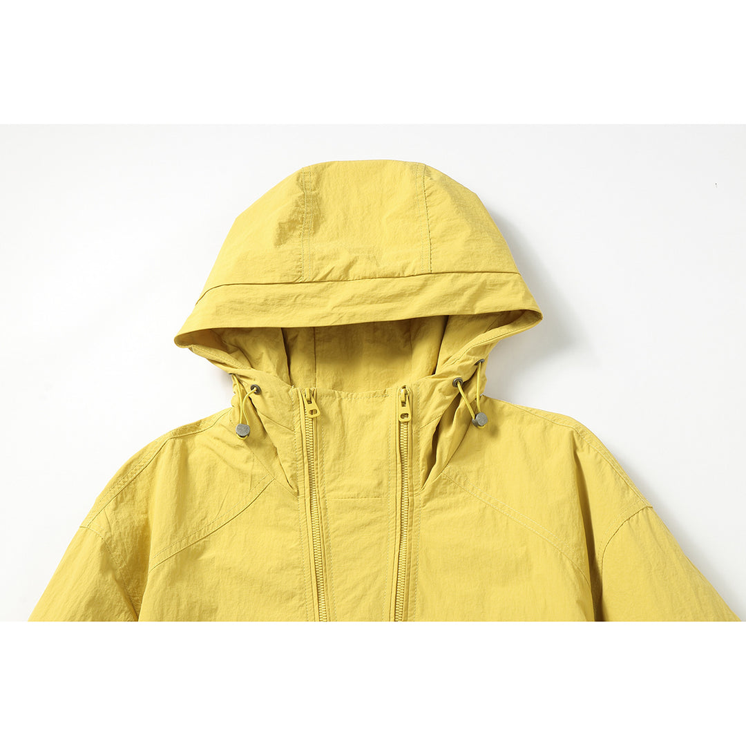 Unisex Leichte Boxy-Windjacke mit Kapuze, Utility-Brusttasche und Kordelzug Shop Nory