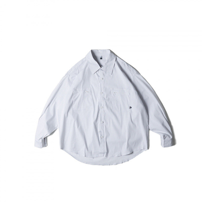 Unisex Oversize-kariertes Hemd mit rundem Saum und aufgesetzten Brusttaschen Shop Nory