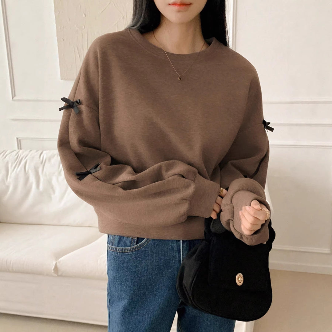Damen Oversize‑Sweatshirt mit dekorativen Schleifenärmeln und Rundhalsausschnitt Shop Nory