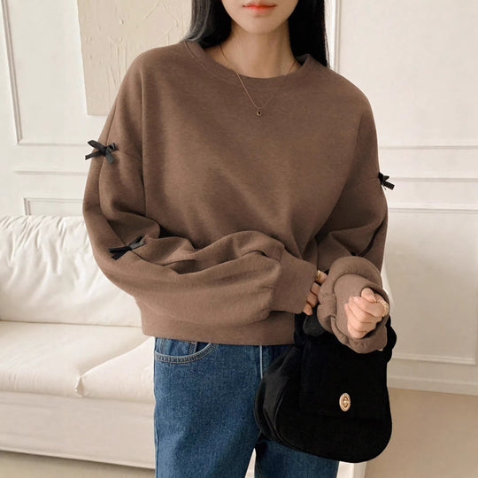Damen Oversize‑Sweatshirt mit dekorativen Schleifenärmeln und Rundhalsausschnitt Shop Nory