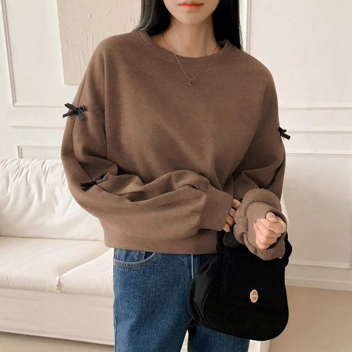 Damen Oversize‑Sweatshirt mit dekorativen Schleifenärmeln und Rundhalsausschnitt Shop Nory