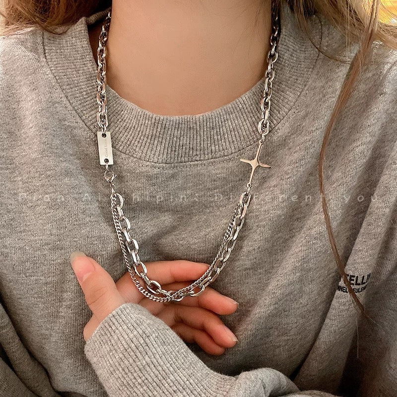 Damen Halskette mit modernem, mehrlagigem Design und funkelndem Sternanhänger Shop Nory