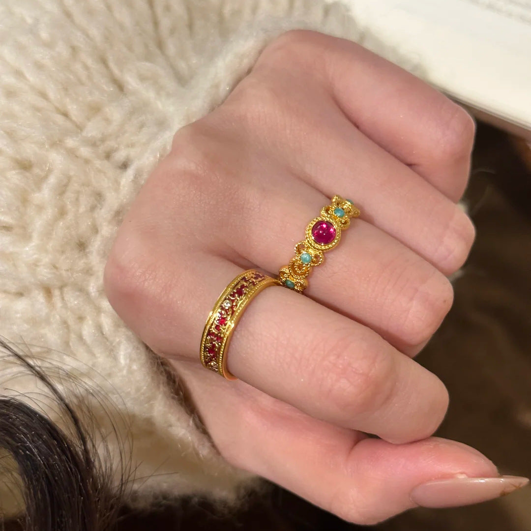 Damenring mit kunstvollem Design und buntem Edelstein Shop Nory