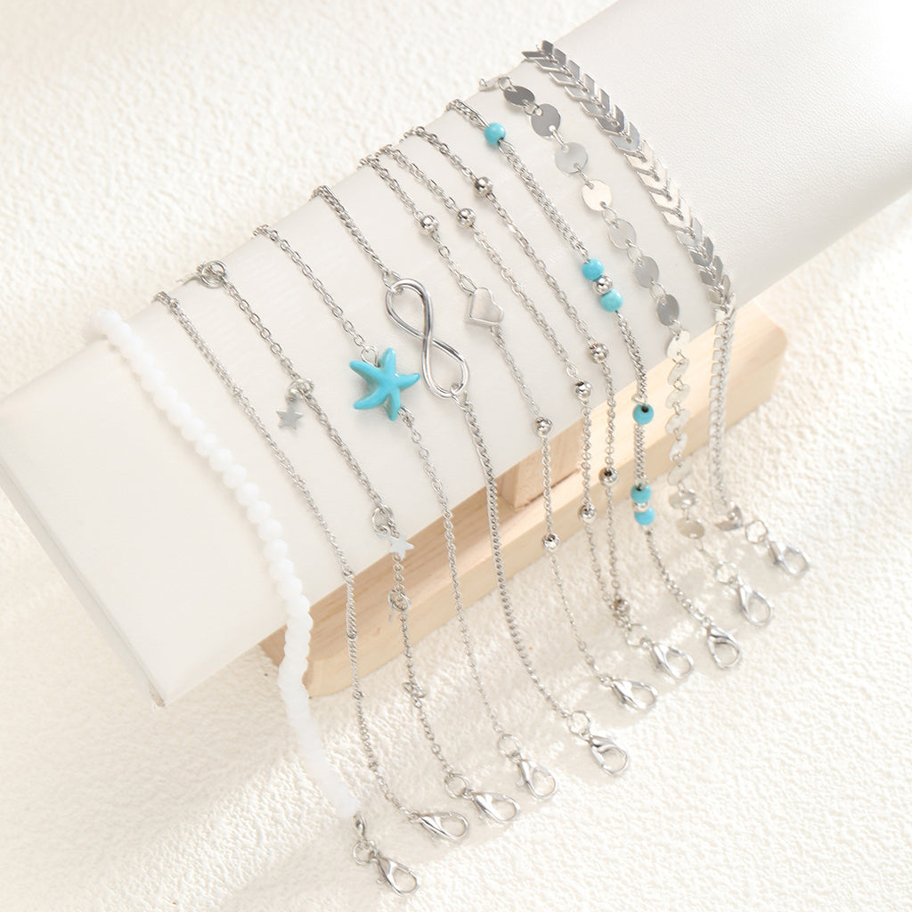 Damen Schmuckarmband-Set mit maritimen Anhängern und bunten Perlen Shop Nory