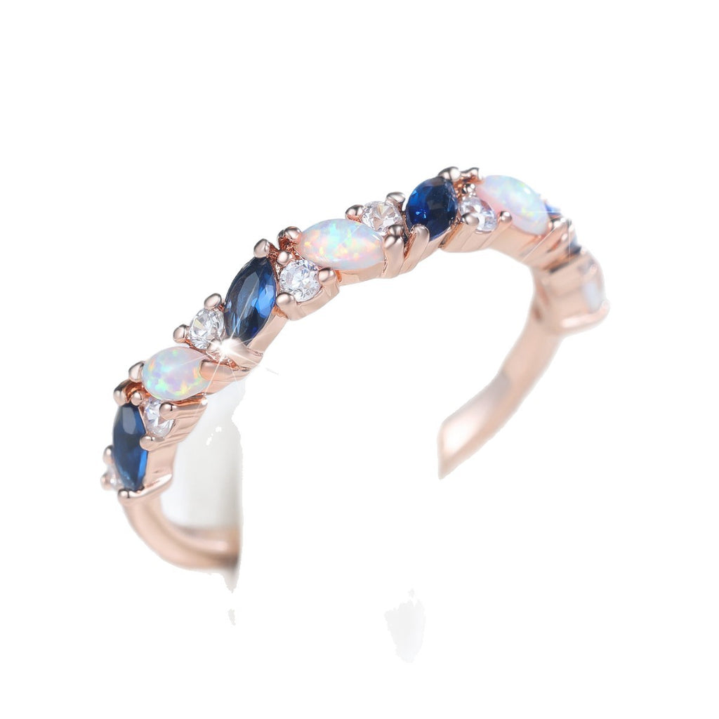 Damen Ring mit funkelnden Opalen und facettierten Granatsteinen Shop Nory