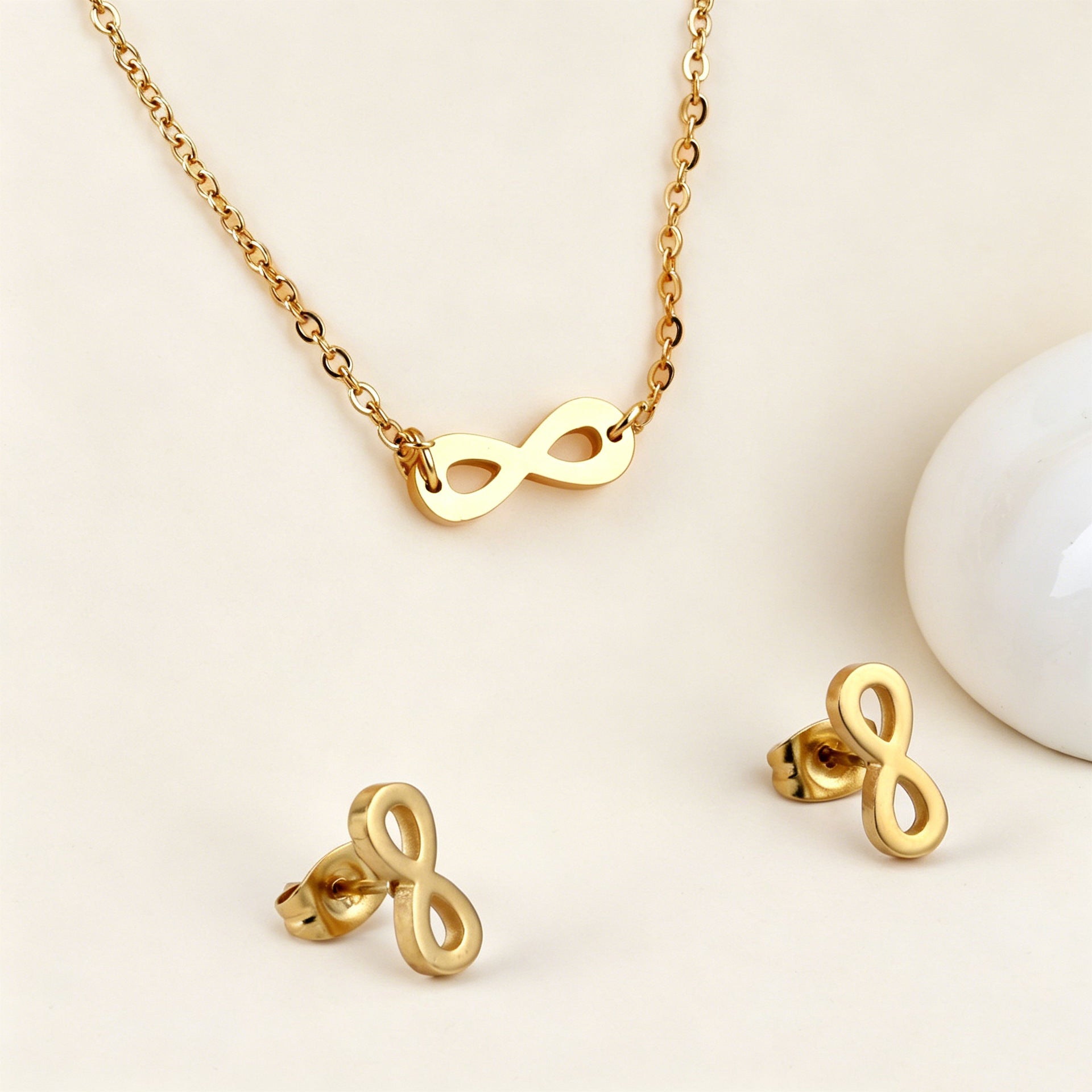 Damen Schmuckset mit unendlichem Symbol aus hochwertigem Edelstahl und goldplattierter Oberfläche Shop Nory