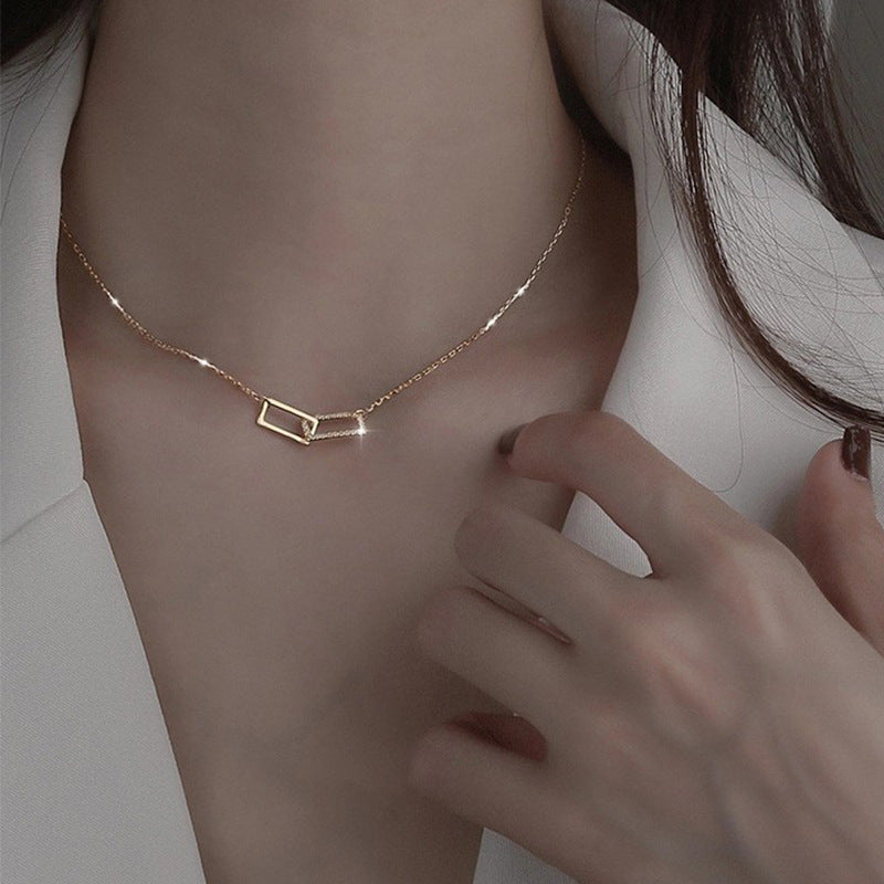 Damen Halskette mit modernen, ineinander verschlungenen Rechtecken und funkelnden Zirkonia Shop Nory