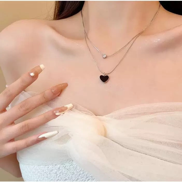 Damen mehrlagige Halskette mit herzförmigem Anhänger und funkelnden Details Shop Nory