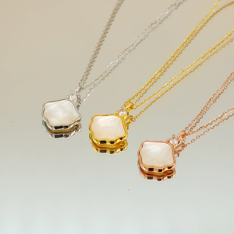 Damen filigrane Halskette mit muschelförmigem Anhänger und funkelnden Zirkonia Shop Nory