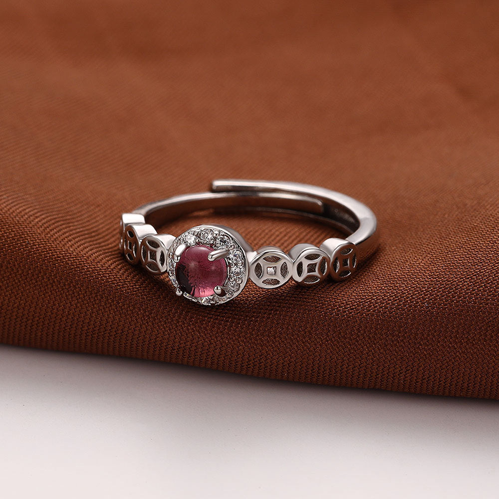 Damenring mit funkelndem Edelstein und elegantem Reliefdesign Shop Nory