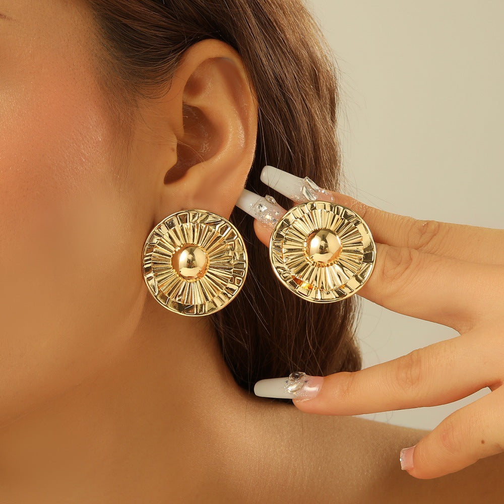 Damen Ohrclips mit kunstvoller goldener Struktur Shop Nory