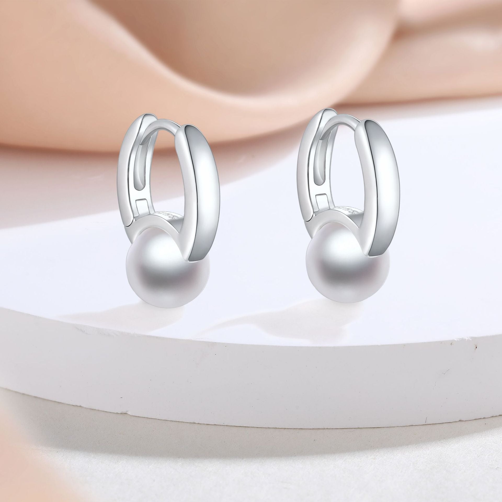 Damen Perlenohrringe mit modernem Ringdesign Shop Nory