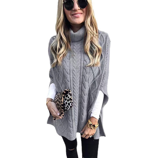 Damen nan kastiger Strickponcho mit hohem Rollkragen, Zopfstruktur und seitlichen Schlitzen Shop Nory