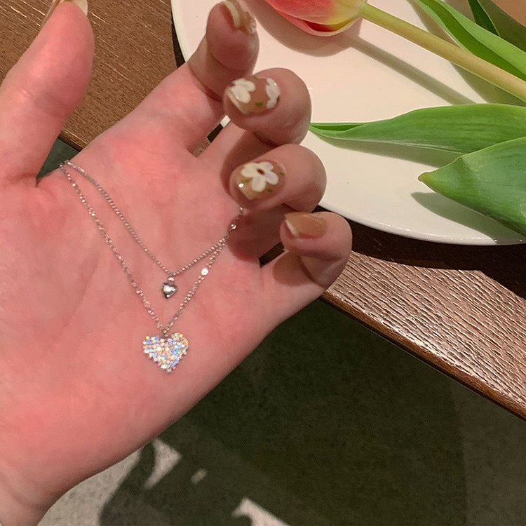 Damen Halskette mit doppeltem Herzanhänger und funkelnden Zirkonia Shop Nory