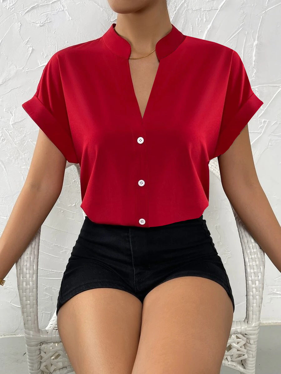 Damen Elegante Kurzarmbluse mit Stehkragen und subtilen Knopfdetails