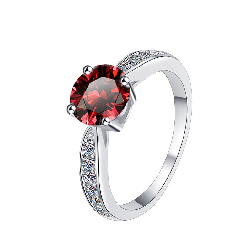 Damenring mit funkelndem rot gefasstem Kristall und elegantem Zirkonia-Besatz Shop Nory