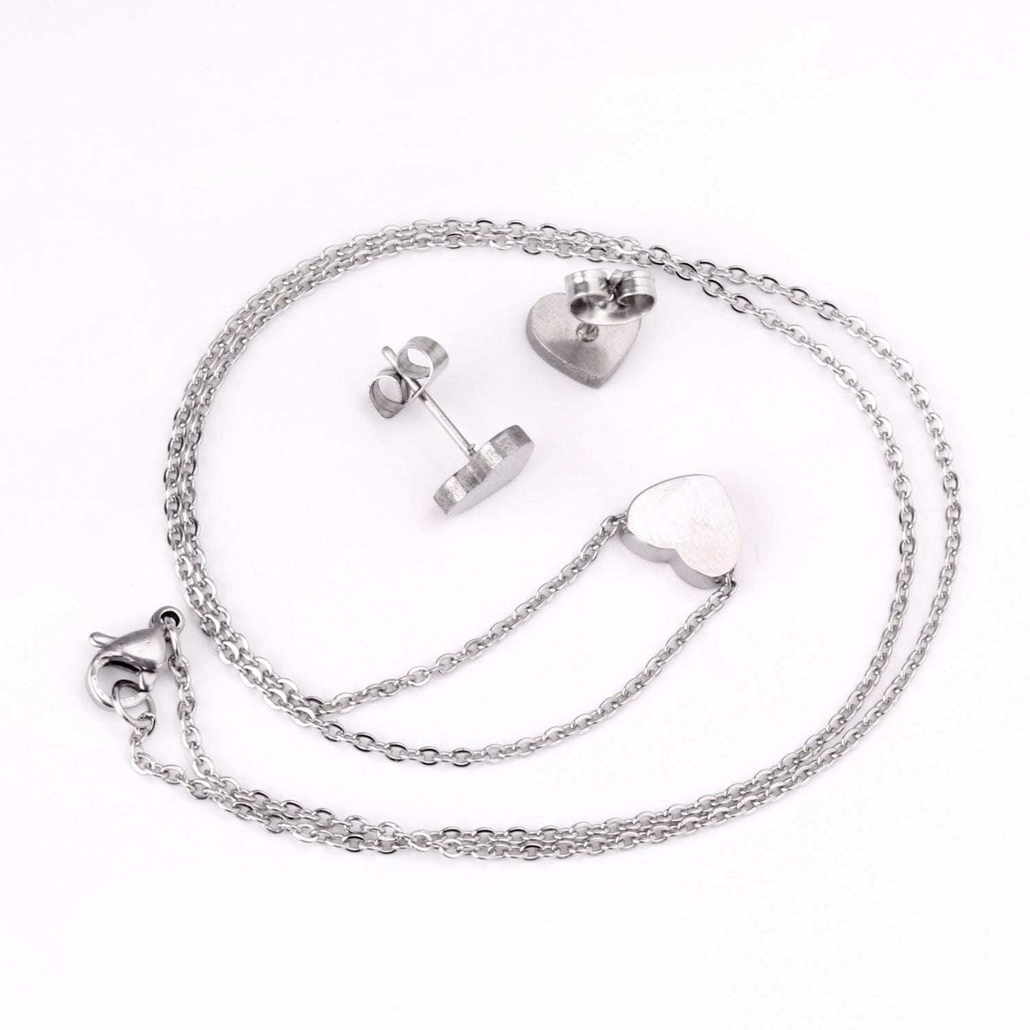 Damen Schmuckset mit herzförmigem Anhänger und passenden Ohrsteckern Shop Nory