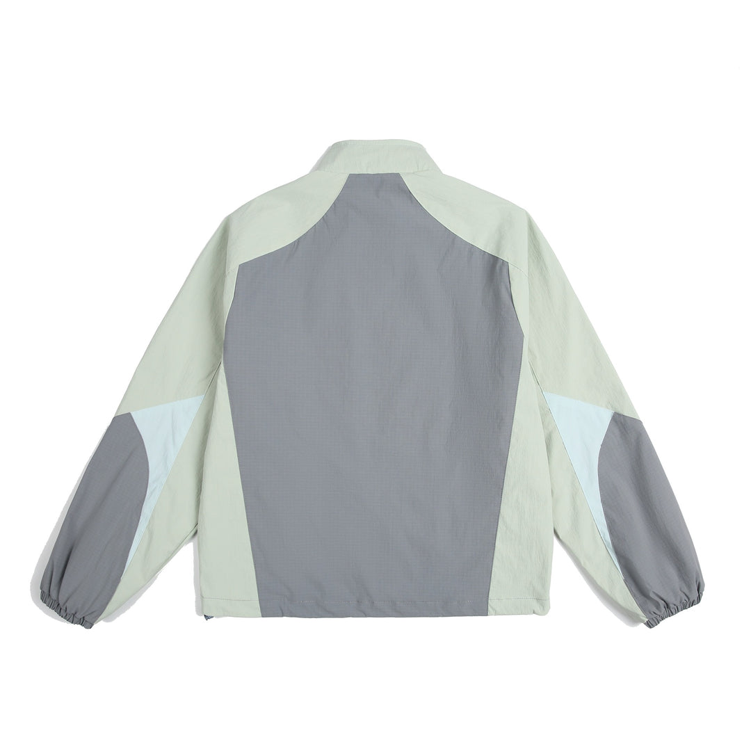 Unisex Leichte Windjacke mit hohem Kragen, Farbmix‑Paneelen und verstellbarem Saum Shop Nory