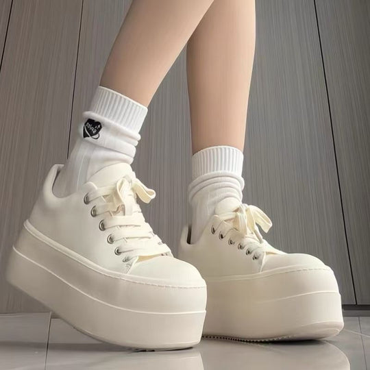 Damen Retro Plateausneaker mit zweifarbiger Lederoptik und extrahoher Gummiplattform Shop Nory
