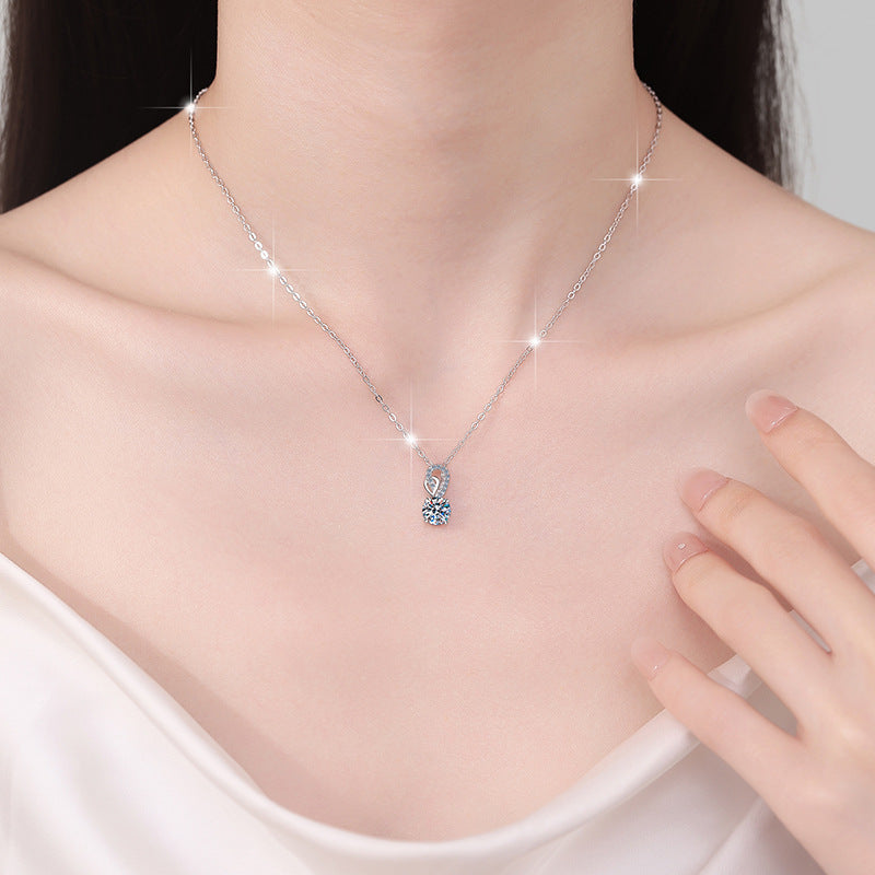 Damen Halskette mit funkelndem, runden Kristallanhänger und eleganter Verzierung Shop Nory