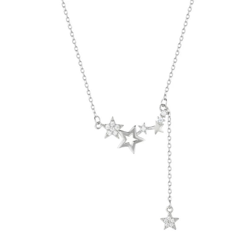 Damen Halskette mit funkelnden Sternanhängern und zarten Details Shop Nory