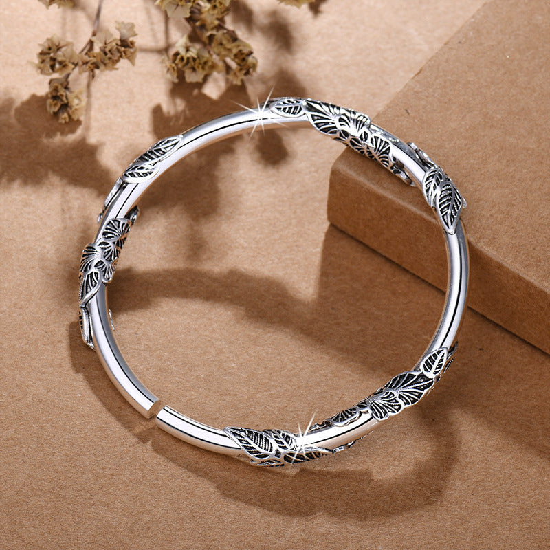 Damen Armreif mit kunstvoller Blumendekoration Shop Nory