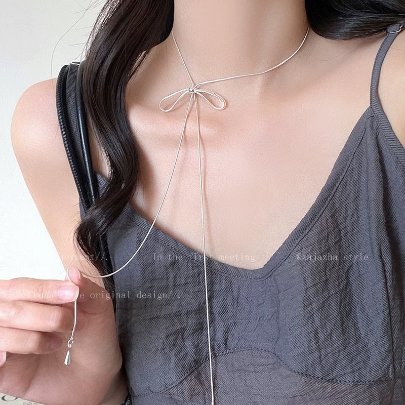 Damen Kette mit elegantem Schleifenanhänger aus hochwertigem Metall Shop Nory