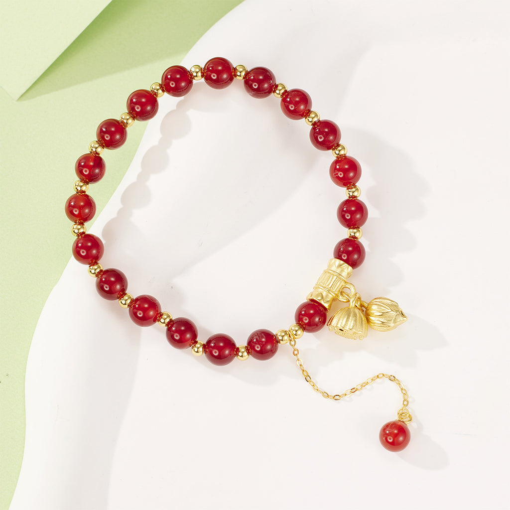 Damen Armband mit kunstvollen Anhängern und eleganten Perlenelementen Shop Nory
