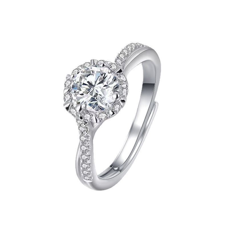 Damen eleganter Ring mit funkelndem Solitär und verspieltem Zirkonia-Besatz Shop Nory