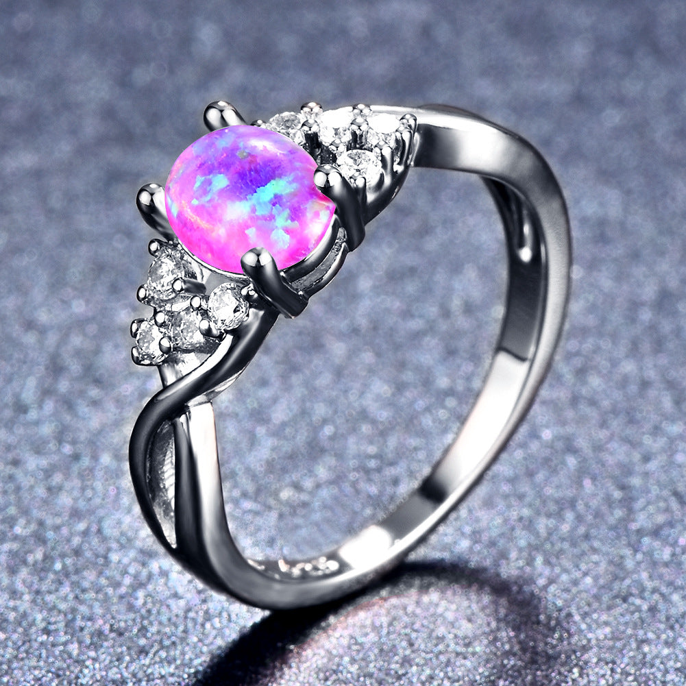 Damen Ring mit schimmerndem Opal und Zirkonia-Verzierungen Shop Nory